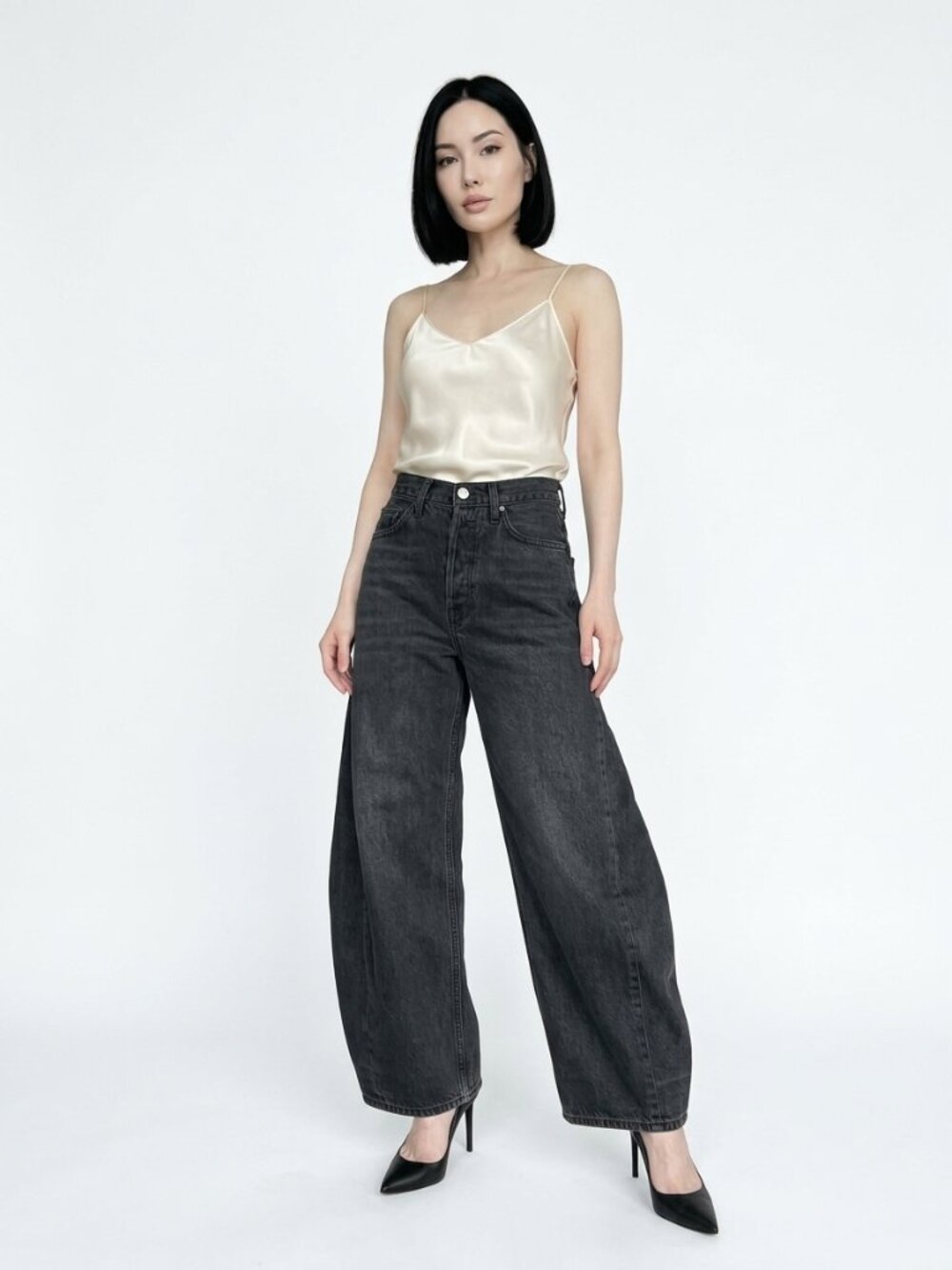 AGOLDE 90s REWORKED SWIRL LEG JEANS IN WASHED BLACK